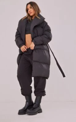 Prettylittlething Black Oversized Collar Belted Longline Puffer Black -Prettylittlething 034ffc51bf162fcd89573548032ab689eaf36295 cmy8656 3