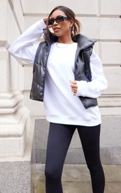 Prettylittlething Black Faux Leather Hooded Curve Panel Vest Black