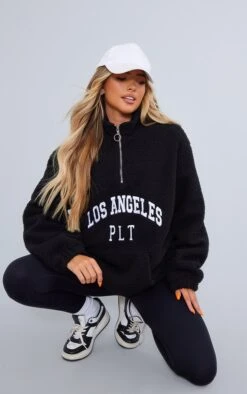 PRETTYLITTLETHING Black Graphic Front Teddy Jacket Black