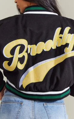 Prettylittlething Black Wool Look Graphic Front Cropped Bomber Jacket Black -Prettylittlething 239cafb9de849af02bb2d381c2a1fdff1c030e05 cmz8314 4