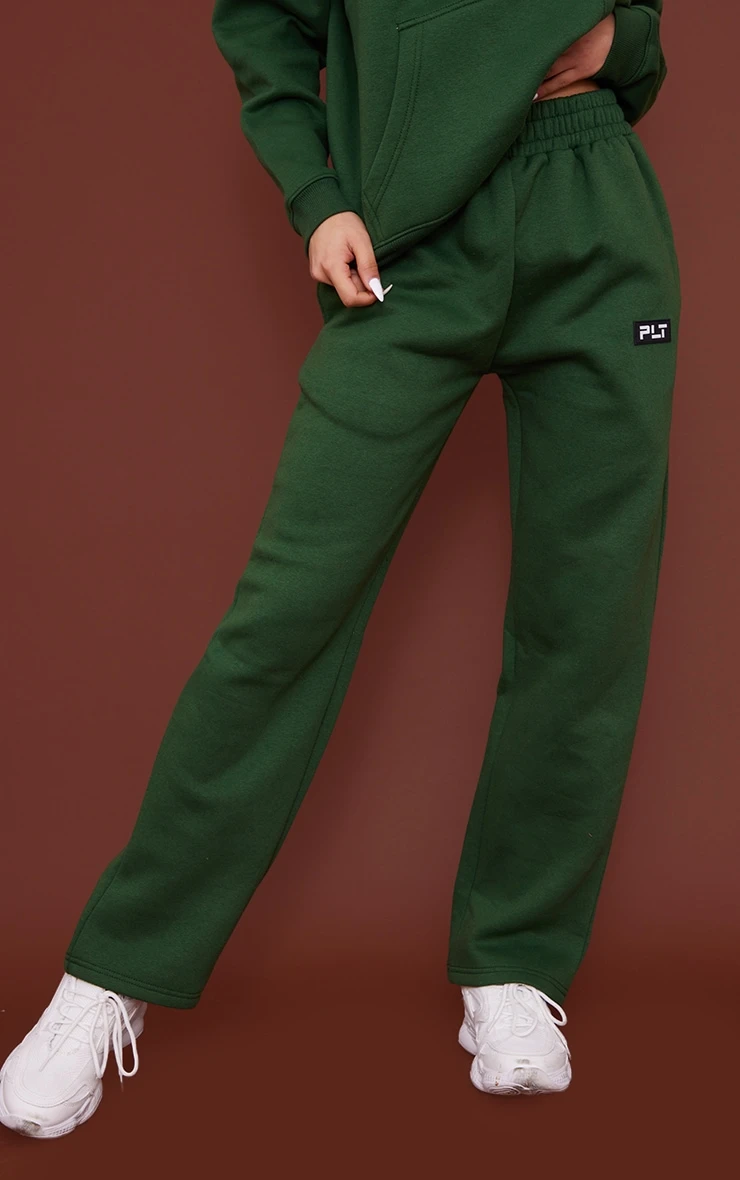 PRETTYLITTLETHING Forest Green Logo Badge Detail Straight Leg Sweatpants Forest Green 2 PRETTYLITTLETHING Forest Green Logo Badge Detail Straight Leg Sweatpants Forest Green - Image 2