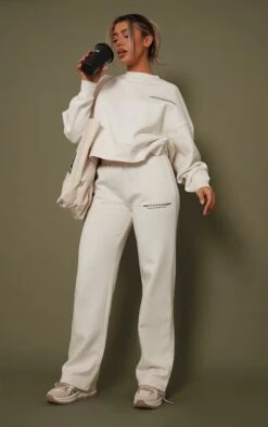 Prettylittlething Premium Sand Printed Straight Leg Sweatpants Sand