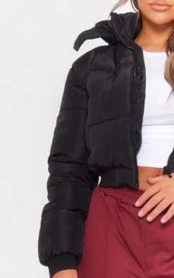 Prettylittlething Black Oversized Cropped Hooded Puffer Coat Black -Prettylittlething 3db435f960ef58c0484d240f229473dfad117c60 cng9772 4