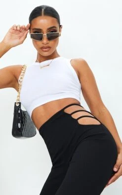 Prettylittlething Black Cut Out Detail Flared Pants Black -Prettylittlething 43651e934fa063232af7b0539446a81ef4073b56 cmo0883 4