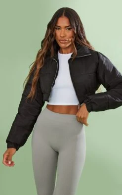 Prettylittlething Black Elastic Hem Cropped Puffer Jacket Black -Prettylittlething 464c5ea0616b7a033fdceb767ca0394a7734008a cmz3413 3