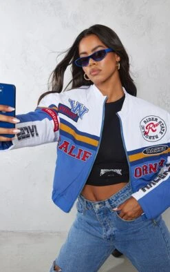 Prettylittlething Blue Oversized Graphic Zipped Racer Bomber Jacket Blue