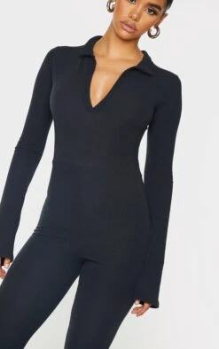 Prettylittlething Black Rib Collar Detail Flare Leg Jumpsuit Black -Prettylittlething 707ebbe1efdd1be3506da583f551c876a14ad738 cmu6466 4