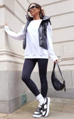 Prettylittlething Black Faux Leather Hooded Curve Panel Vest Black -Prettylittlething 7a5830616935102f479034c383897cadb7f3c833 cms6007 3