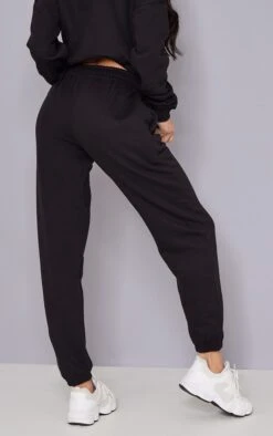 PRETTYLITTLETHING Black Print Cuffed Sweatpants Black -Prettylittlething 7f4427997efd174f11bffbc77c79482b1053cd07 cmv5005 3