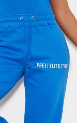 PRETTYLITTLETHING Blue Logo High Waisted Cuffed Sweatpants Blue -Prettylittlething 8541a9300e559c7e4f4d6f6df68bac1bdf95e214 cna7287 4