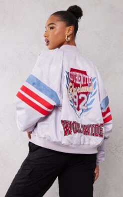 PRETTYLITTLETHING Blue Graphic Front Satin Look Varsity Bomber Jacket Blue
