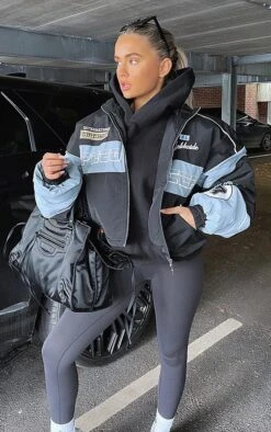 Prettylittlething Black Oversized Graphic Zipped Racer Bomber Jacket Black