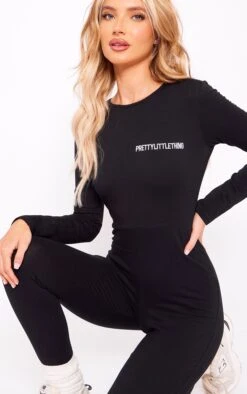 PRETTYLITTLETHING Black Cotton Long Sleeve Jumpsuit Black -Prettylittlething bc971aa125f840cfd7467a9ef06af71331721286 cnh0626 4