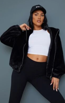 Prettylittlething Black Faux Fur Balloon Sleeve Hooded Jacket Black