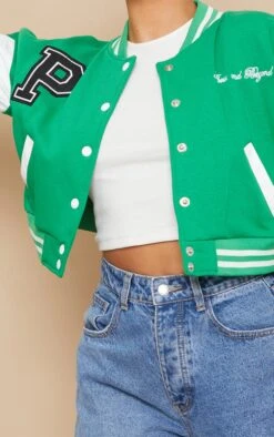 PRETTYLITTLETHING Green Varsity Graphic Contrast Sleeve Bomber Jacket Green 8 PRETTYLITTLETHING Green Varsity Graphic Contrast Sleeve Bomber Jacket Green -Prettylittlething c190d510a4688429d2d065e83f2aee2894a2be87 cmz3991 4