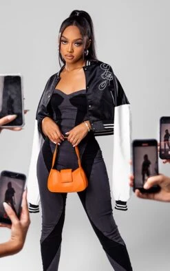 Prettylittlething Black Stripe Trim Contrast Sleeve Satin Cropped Varsity Bomber Jacket Black