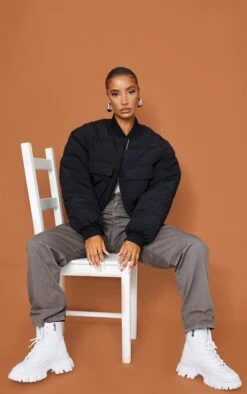 Prettylittlething Black Nylon Pocket Front Panel Sleeve Oversized Bomber Jacket Black -Prettylittlething cba1e3e542e1d647ab4ab7e9b4917fcd8a106d17 cms6058 3