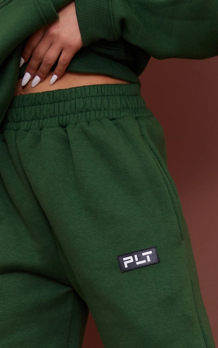PRETTYLITTLETHING Forest Green Logo Badge Detail Straight Leg Sweatpants Forest Green 4 PRETTYLITTLETHING Forest Green Logo Badge Detail Straight Leg Sweatpants Forest Green - Image 4
